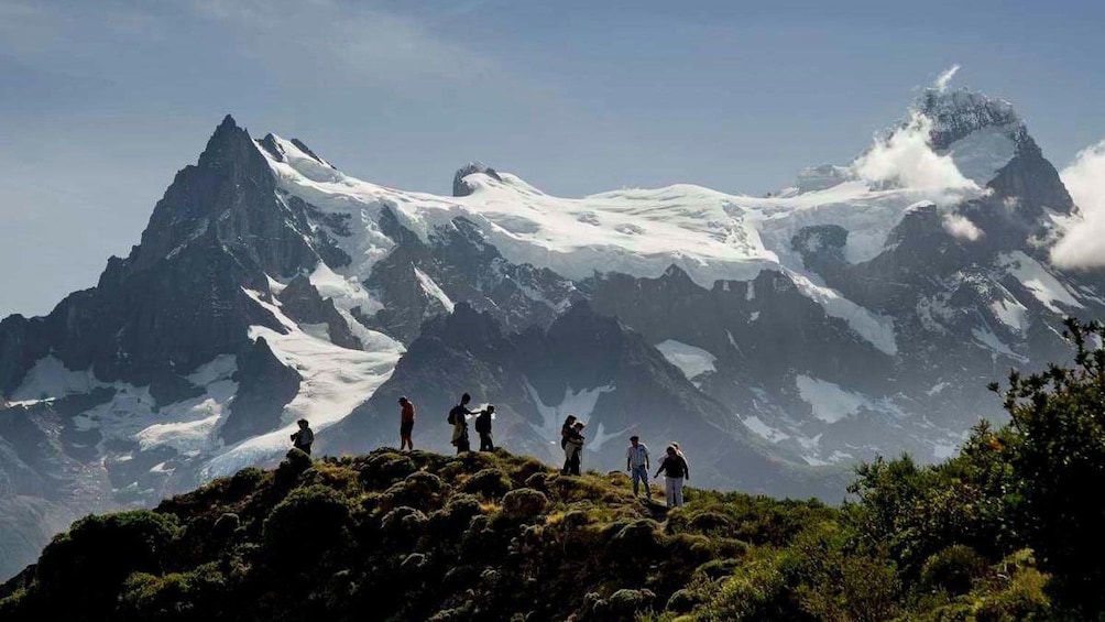 Landscape view of tourists viewing the stunning look of Torres del Paine National Park