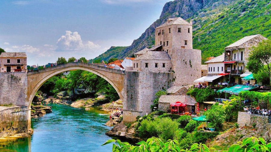 Crossing the old bridge of Stari Most in Mostar