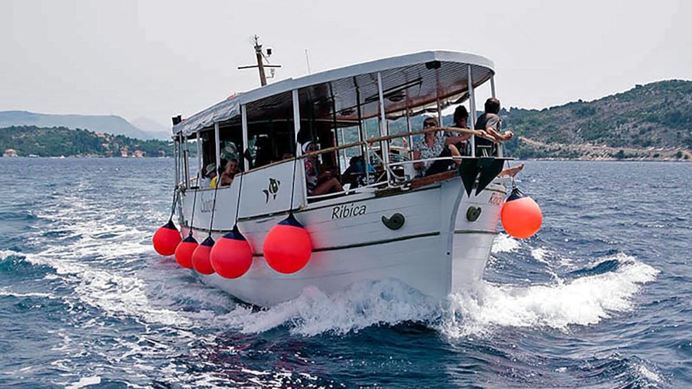 Aboard a small boat near Elaphite Islands