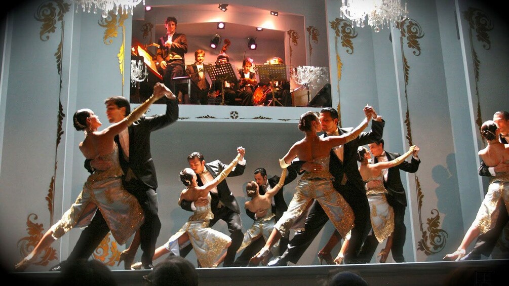 Group of dancers performing a tango at the Café de los Angelitos Tango Show in Buenos Aires