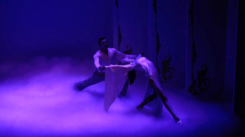 A couple performing at the Café de los Angelitos Tango Show in Buenos Aires 