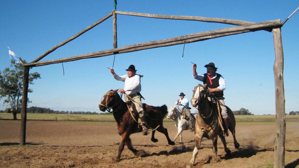 People riding on horses at the ranch at Estancia Santa Susana in Buenos Aires 