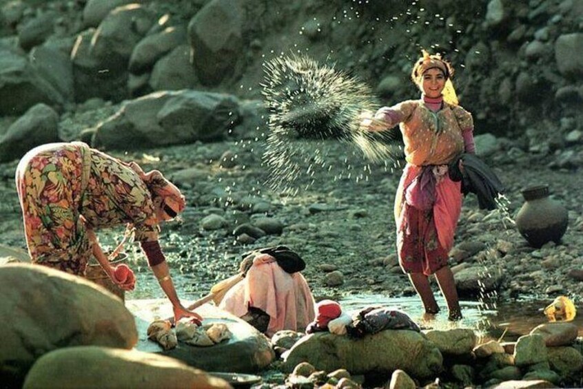 Berber ladies washing clothes in the river