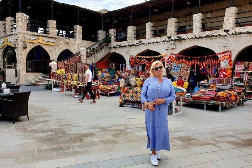 our traveler wandering in historic open-air street market , where once the bedouins were selling goods.