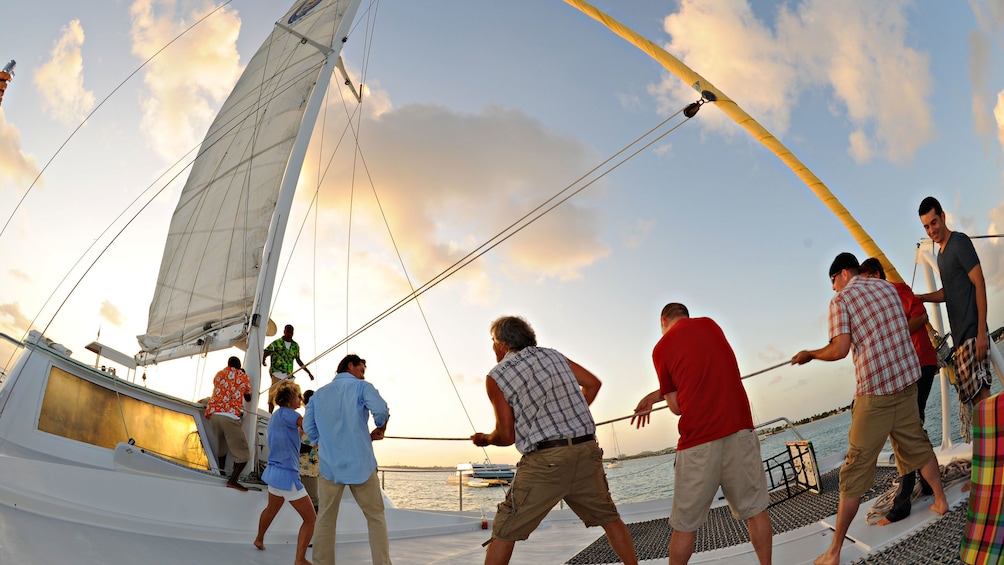 Crew of the Tango catamaran getting ready to set sail for Simpson Bay