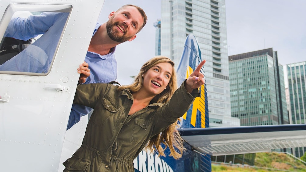 Man and woman in a seaplane in Vancouver