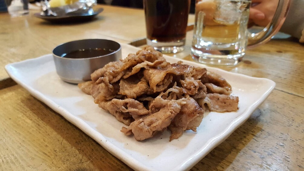 Show item 3 of 10. Otaru Walking & Street Food Tour in Hokkaido