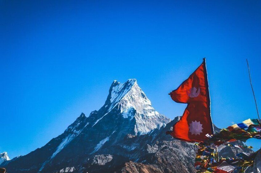 Machhapuchre with Nepal National Flag.