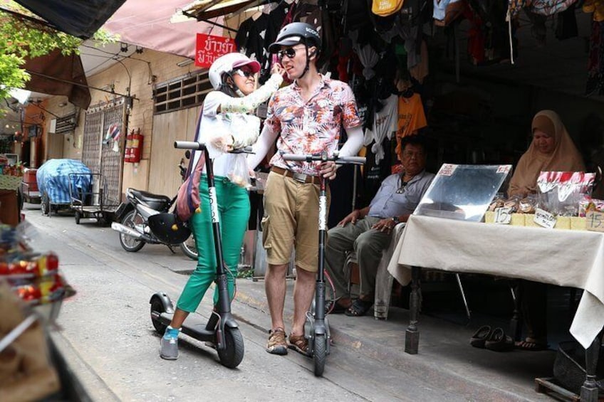 Explore Bangkok by E-Scooter & Try Street Food
