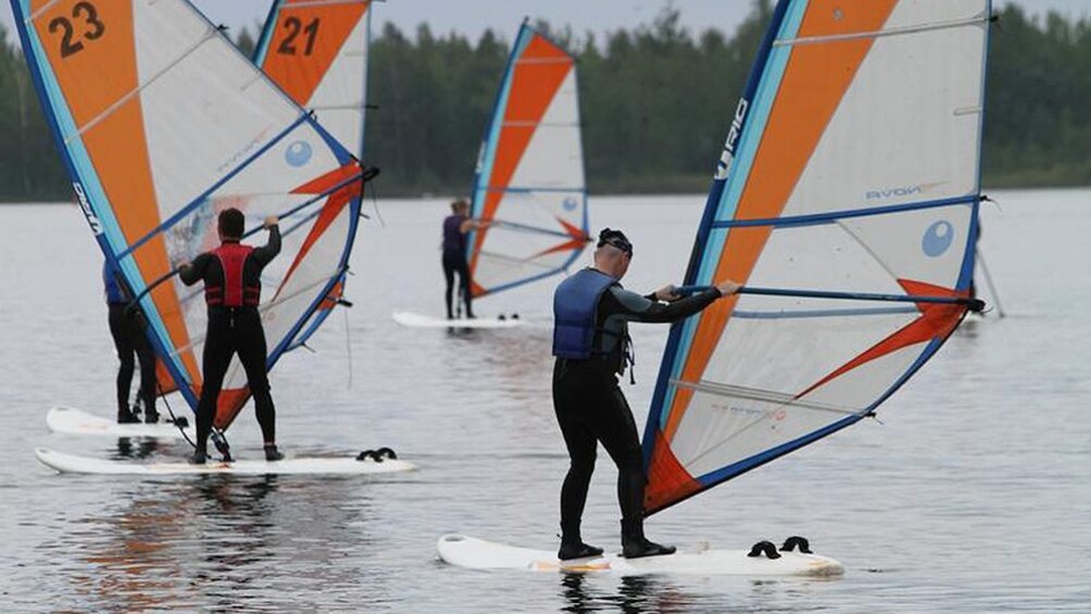 Group learning how to windsurf in Brisbane