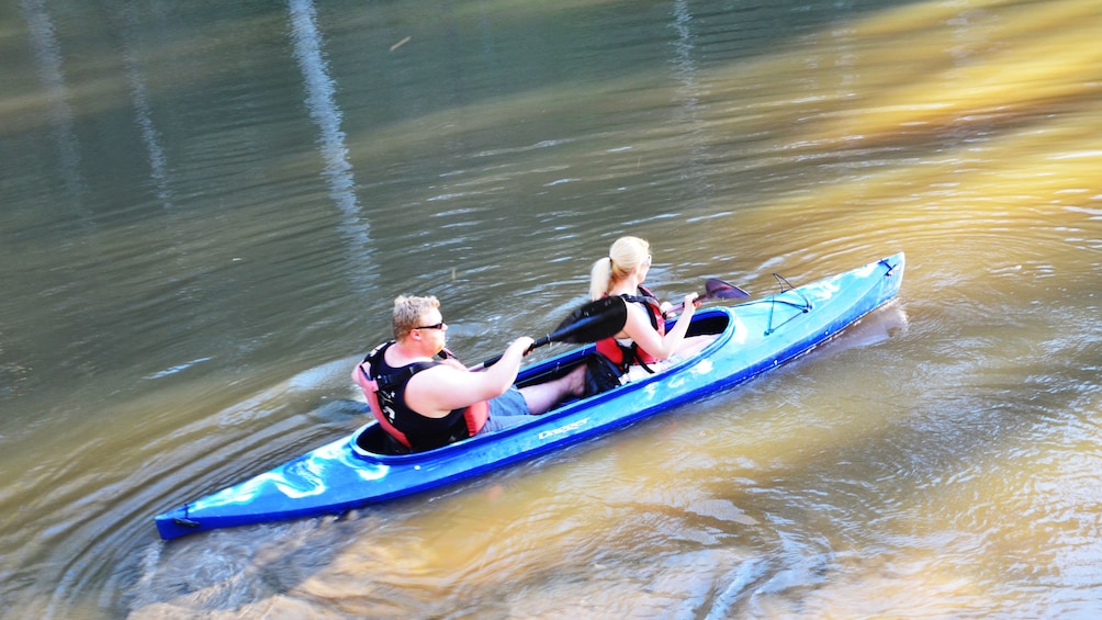 Couple paddling in Kayak in Melbourne