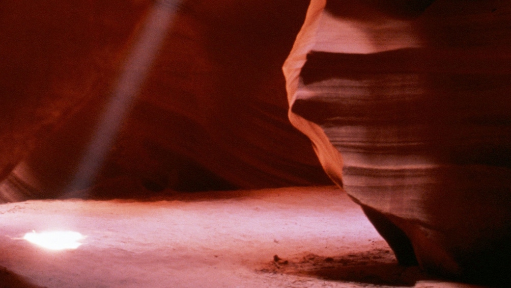 Sun pours through the ceiling of Antelope Canyon