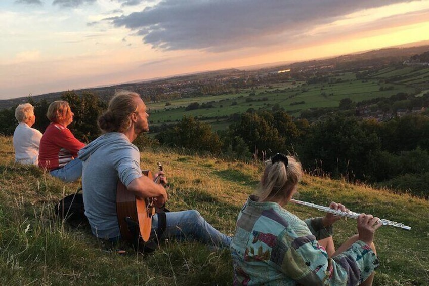 Small group walk around the Tor with music