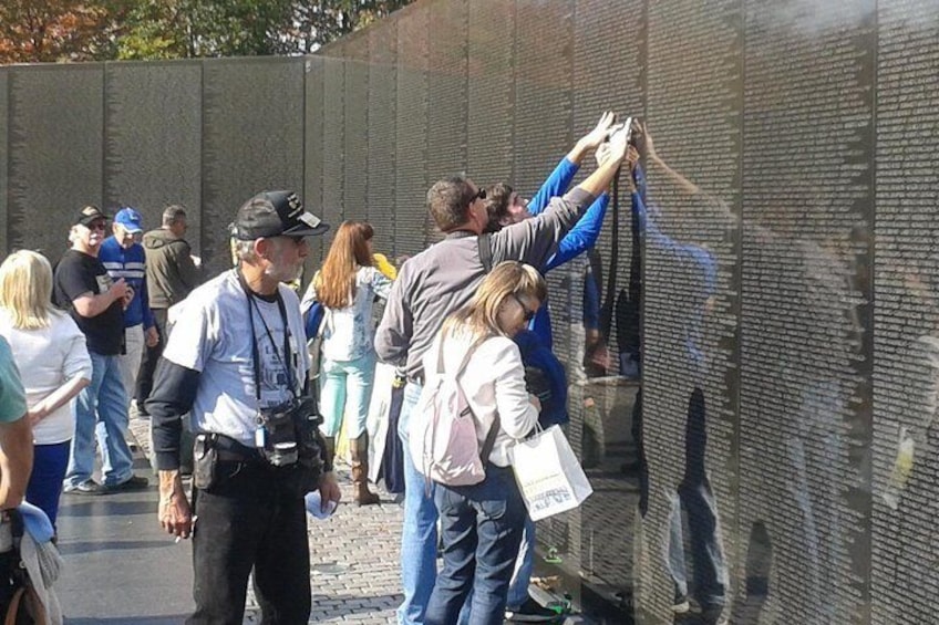 Honoring and remembering at the Vietnam Veterans Memorial.