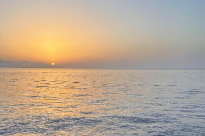 Sunset - sailing cruise on yacht catamaran, Rethymno, Crete