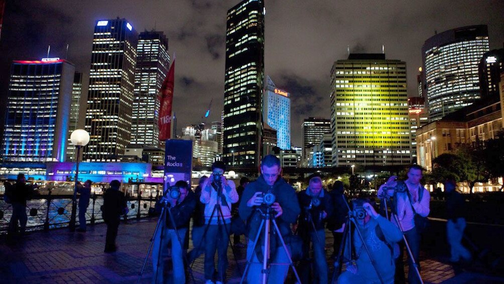 group of photographers taking night photos in Sydney