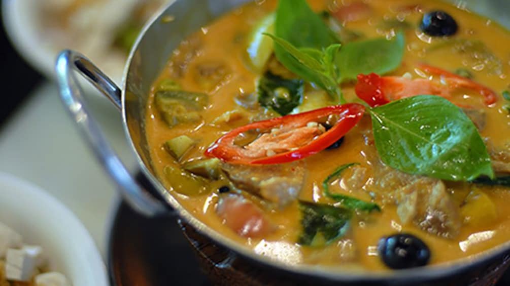 close up of Thai curry recipe sautéing at food tour in Melbourne 