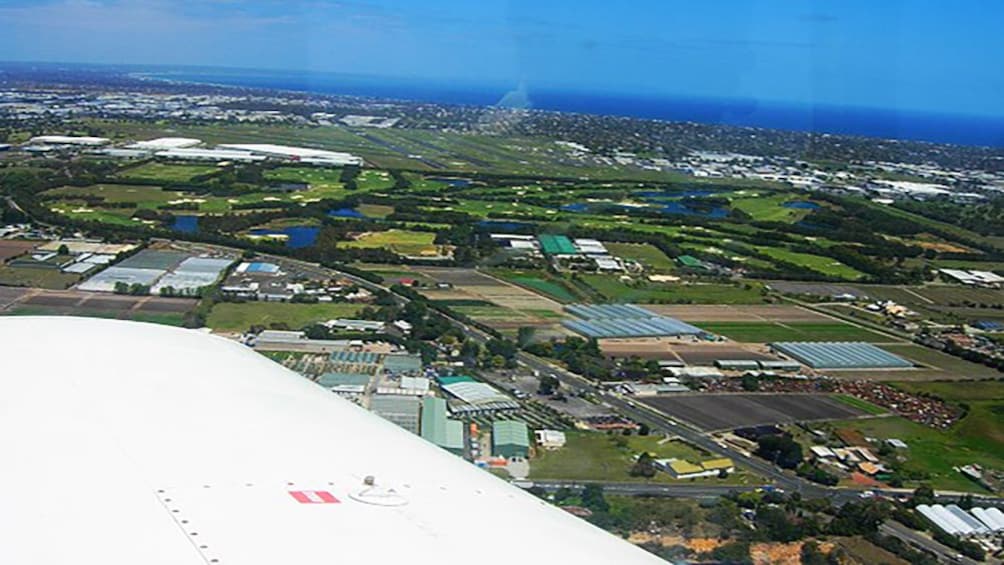 Show item 3 of 4. view from plane cockpit over Melbourne