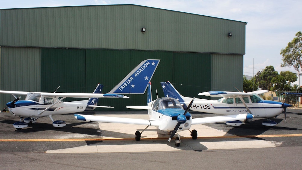 Show item 2 of 4. three small aircraft at aircraft training school in Melbourne