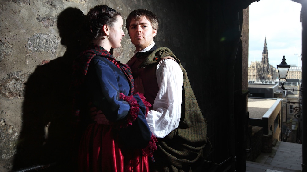 Show item 1 of 5. couple in costumes in edinburgh