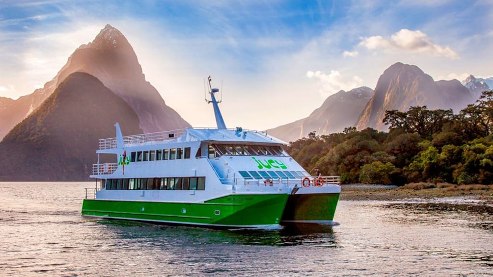 Show item 1 of 10. Cruise ship on Milford Sound in New Zealand.