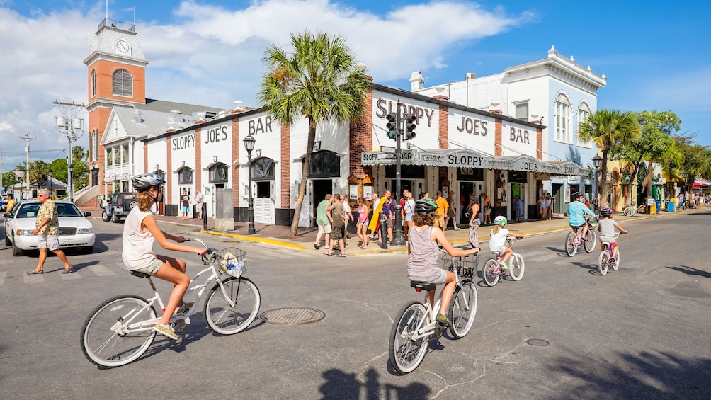 Riding bikes near a bar in Miami