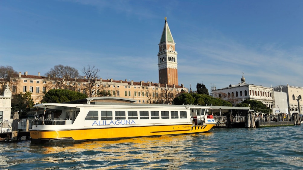 Tour boat on a canal in Venice Italy 