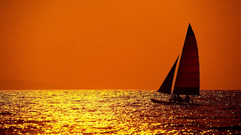 Catamaran sailboat at sunset in St Kitts