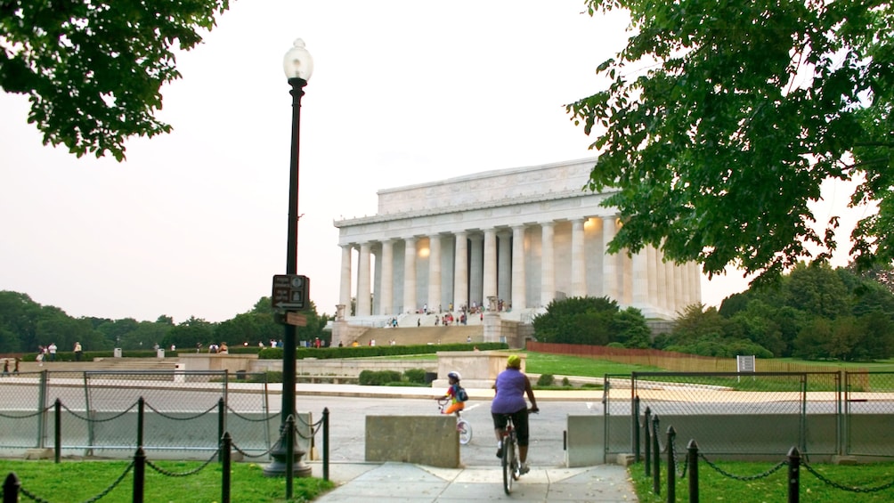 Show item 1 of 3. Biking towards the Lincoln Memorial in Washington DC