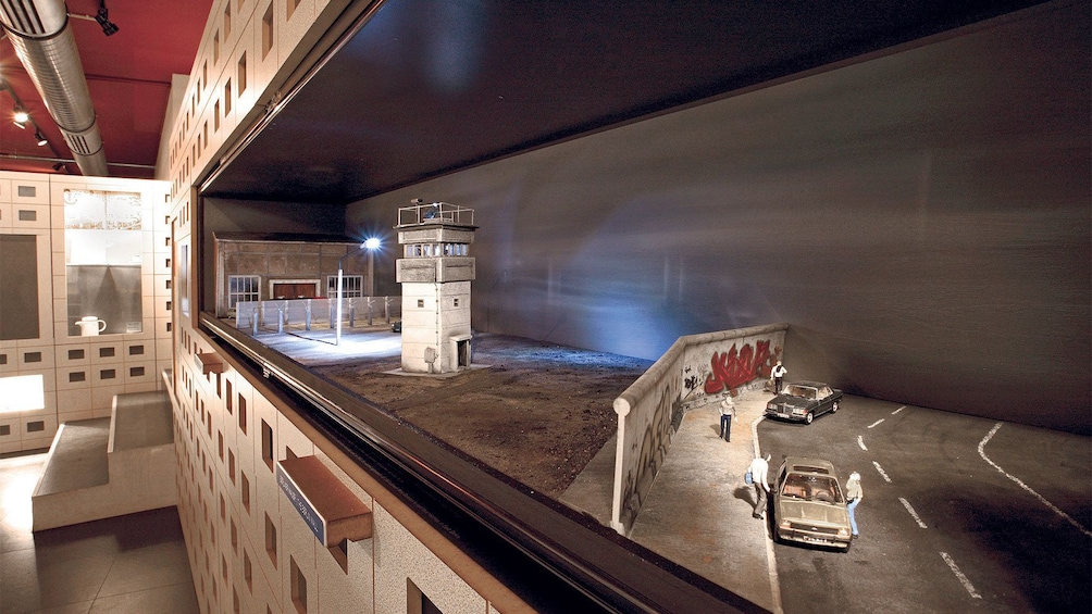 miniature scale replica of the Berlin wall "death strip" display at the  DDR Museum In Berlin