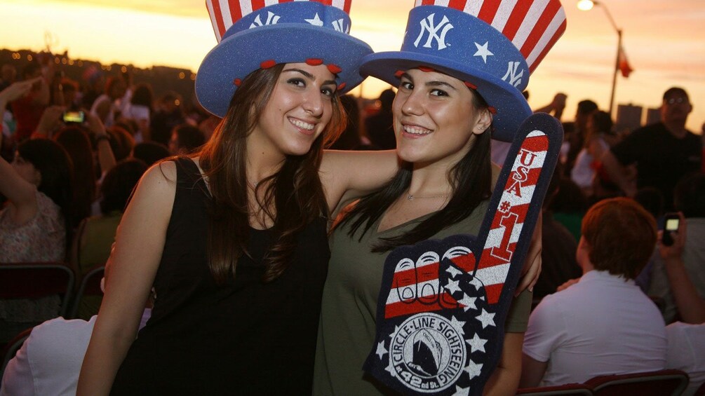 Pair of smiling girls in patriotic apparel in New York