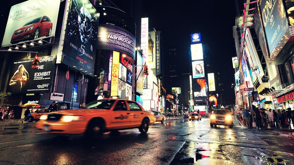 Taxis in Times Square at night in New York