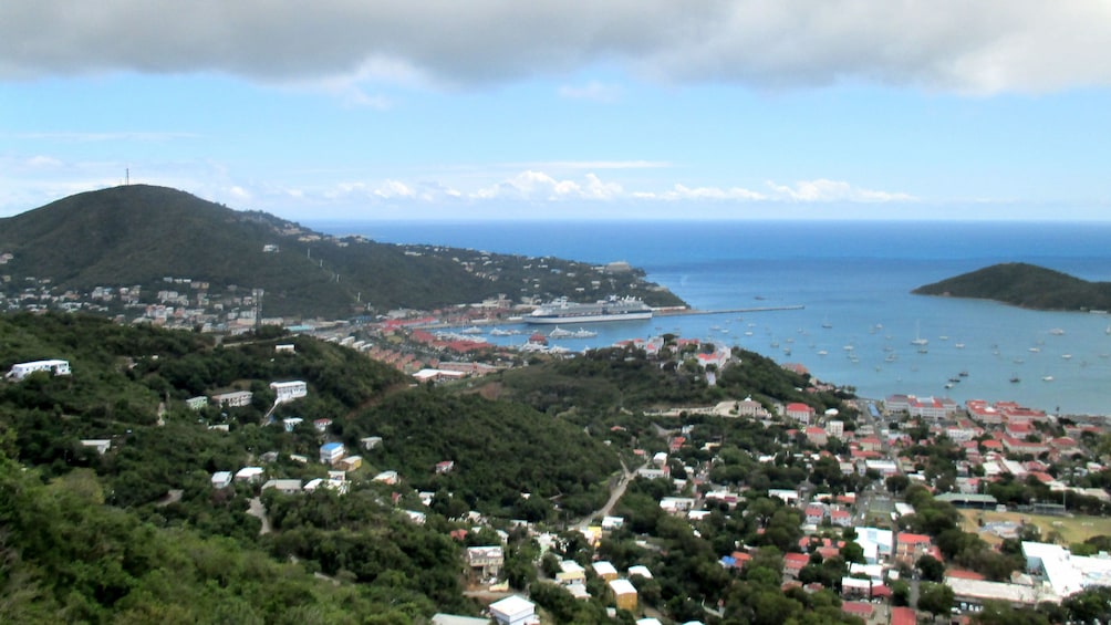 Aerial view of houses with Magen's Bay in the distance in St. Thomas.