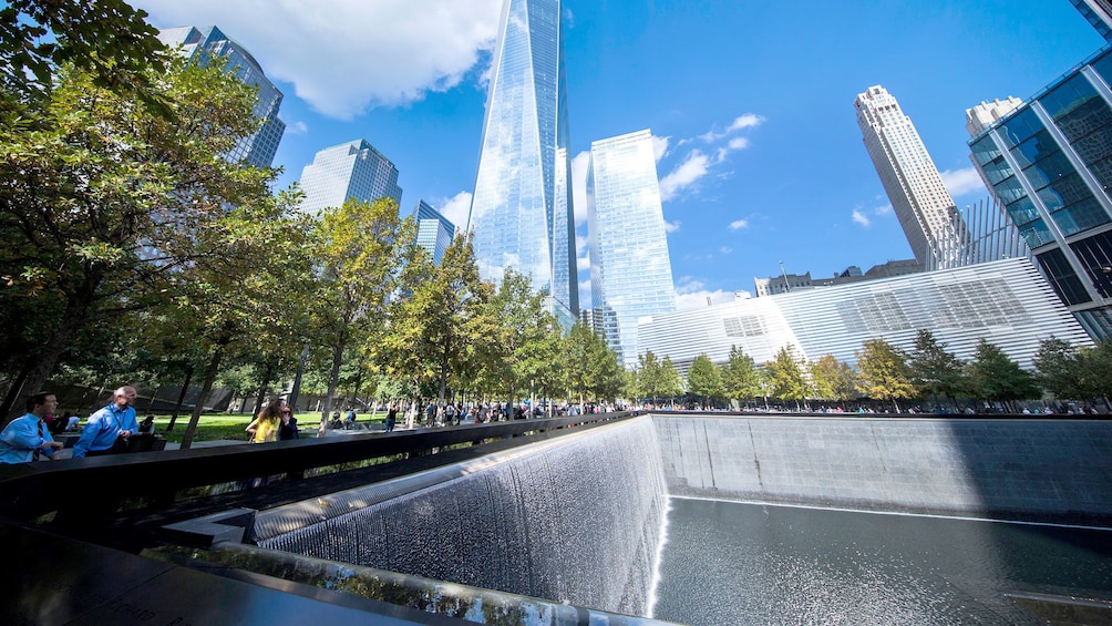 View of One World trade center and reflecting pool at the National September 11 Memorial Museum in New York
