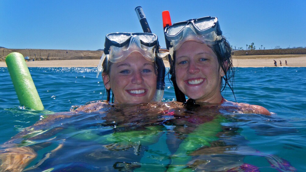 Snorkelers in the water at Los Cabos