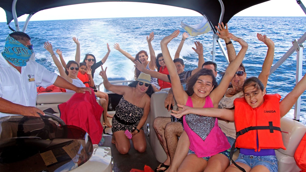 Cheering luxury boat passengers in Mexico