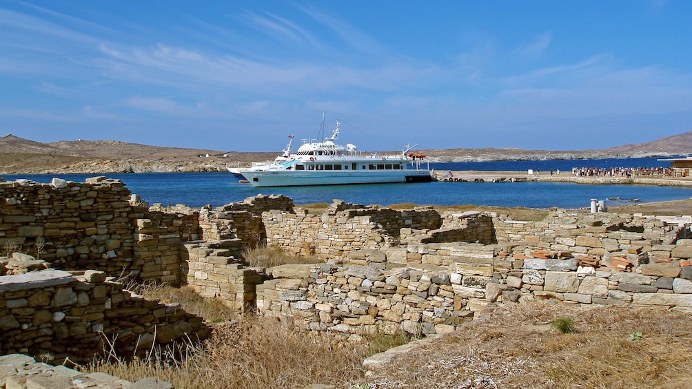 Tour boat docked on Delos Island