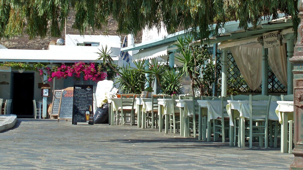 Outdoor tables at a cafe in Mykonos