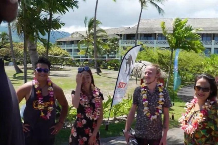 Traditional Polynesian welcome with flower necklaces