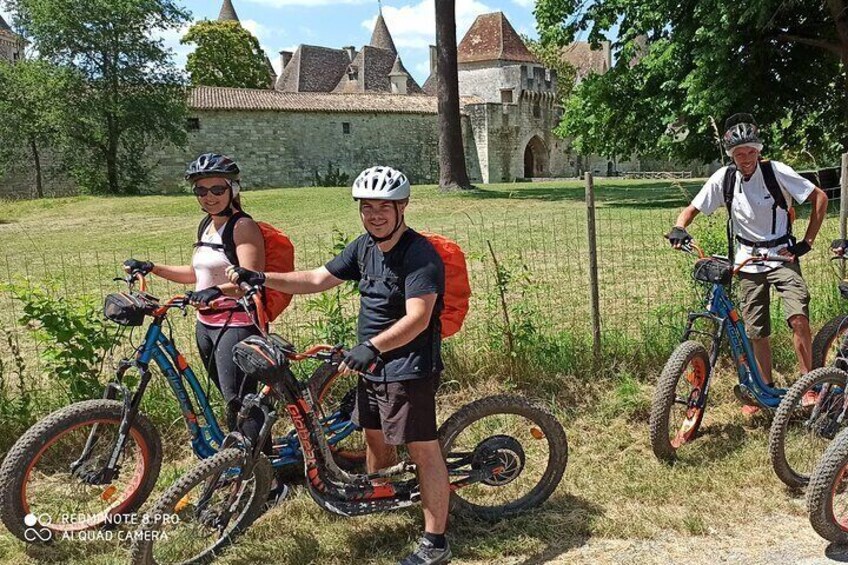 In front of the Chateau de Bridoire in Ribagnac