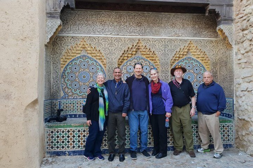 Hamid with his customers at the kasbah (the Morris mosaic)