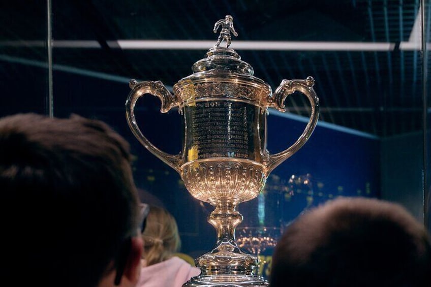 Visitors gaze upon the Scottish Cup