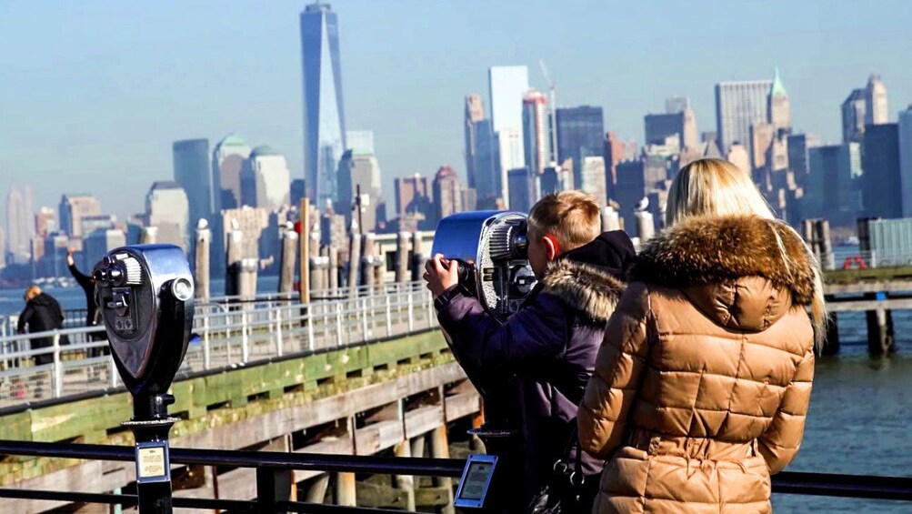 Looking at the Statue of Liberty from pay binoculars