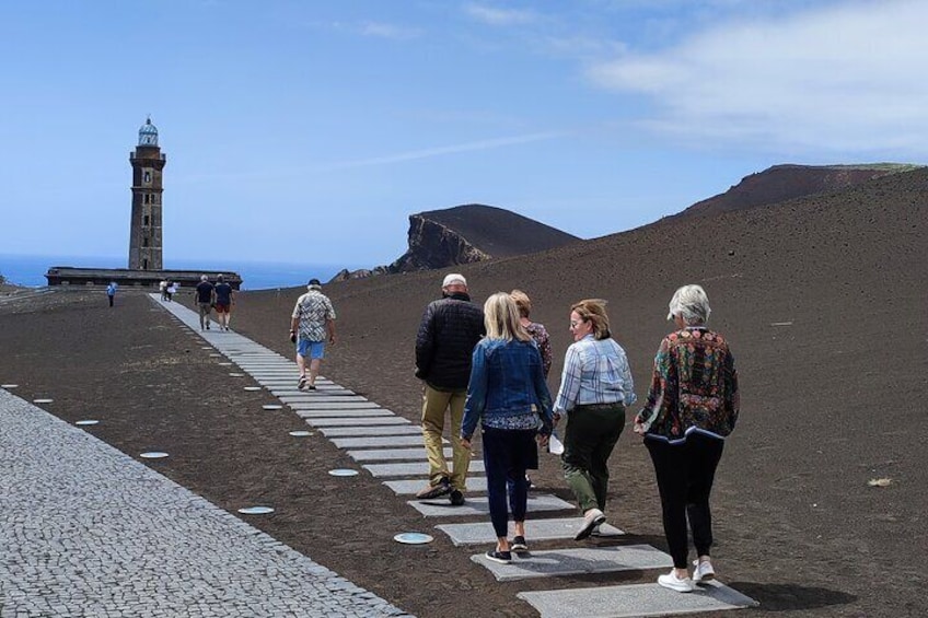 Towards the Volcano. The first floor of the lighthouse in the background is under sand and ash.