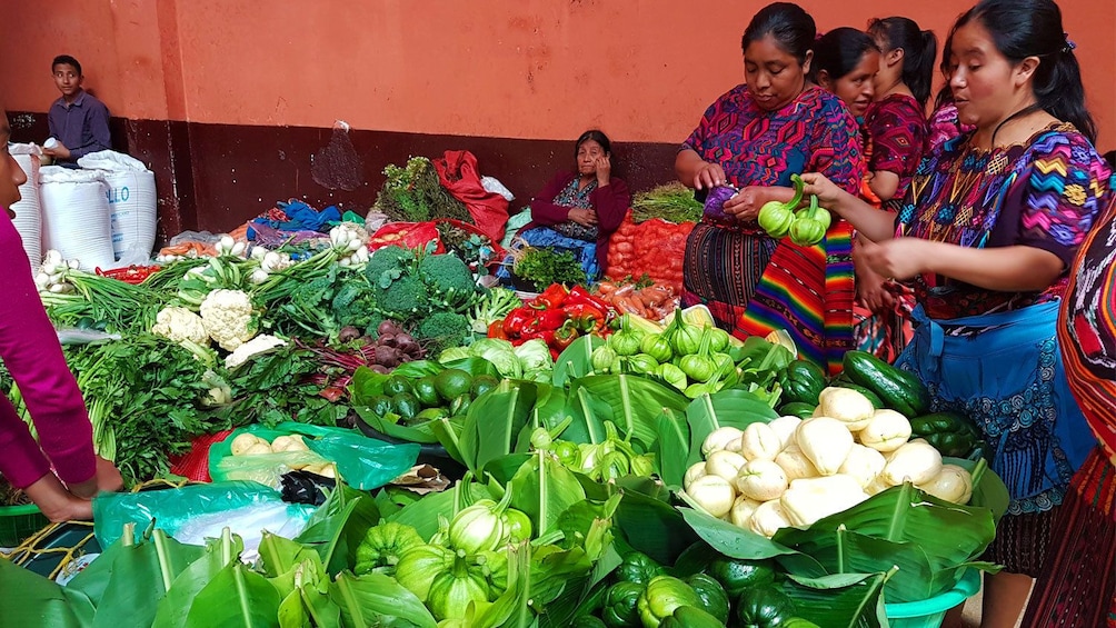 Large spread of fresh vegetables in Chichicastenango market in Guatemala