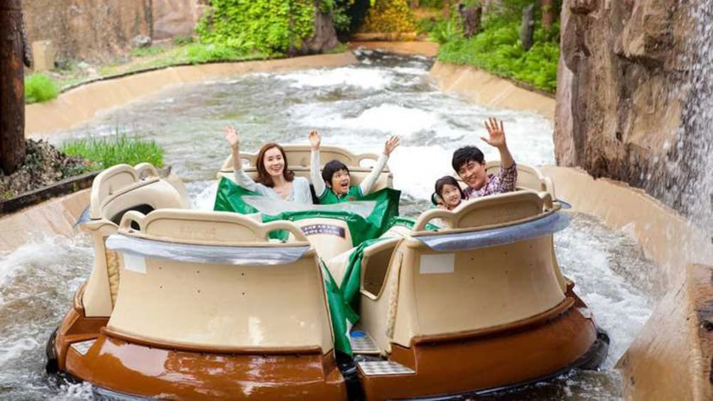 Family on a water ride at Everland Theme Park in Seoul