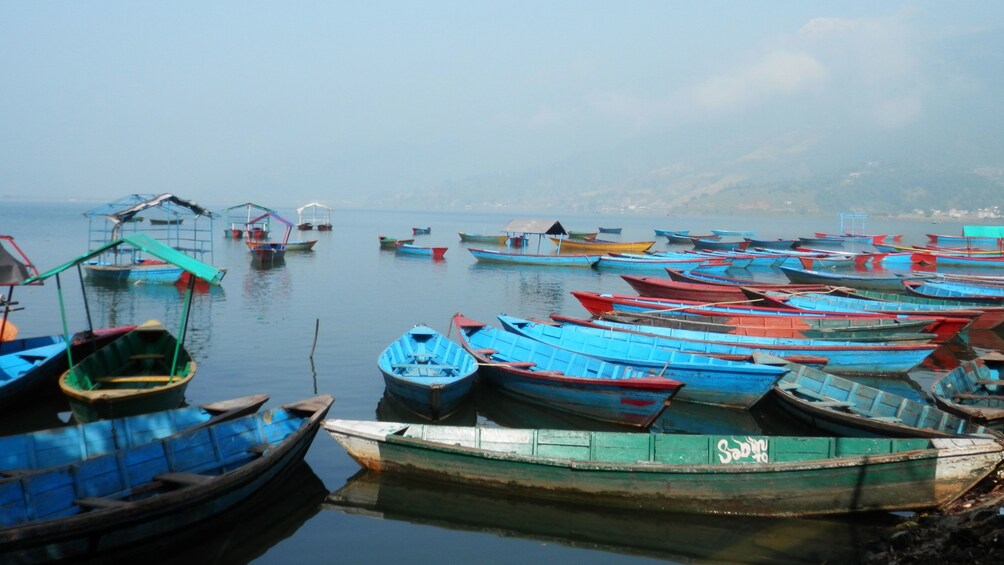 colorful fishing boats on the water at Pulau Ketam