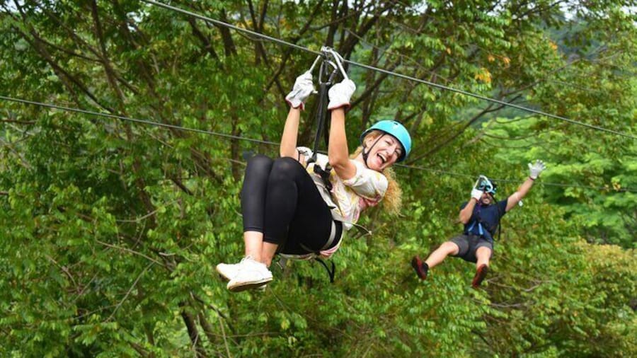 Experience the longest twin Zipline in Central America plus 9 more lines!