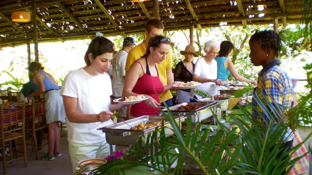 Tour group enjoying a buffet lunch in Saint Lucia