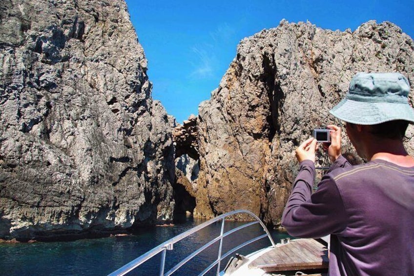 Client taking pictures during the boat trip to Cap de Formentor